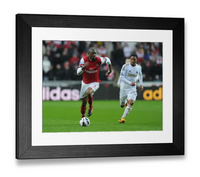 Framed Print : Abou Diaby Outmaneuvers Jonathan de Guzman: A Premier League Battle at Swansea City, 2012-13 Framed Print : Abou Diaby Outmaneuvers Jonathan de Guzman: A Premier League Battle at Swansea City, 2012-13