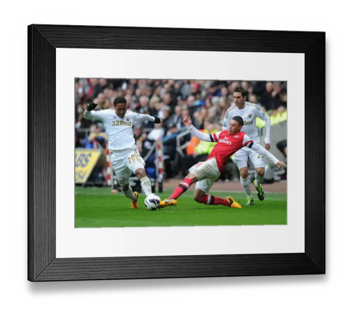 Framed Print : Clash of Midfielders: Oxlade-Chamberlain vs. de Guzman (Swansea City vs. Arsenal, 2012-13)