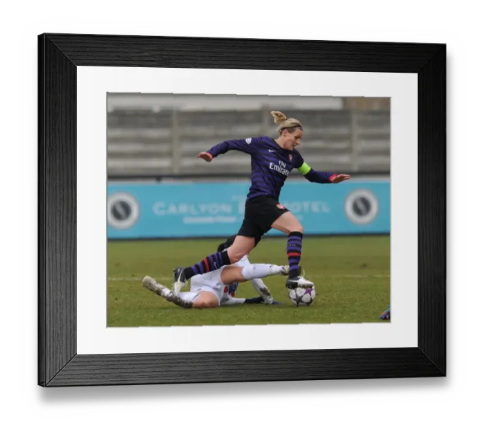 Framed Print : Arsenal Ladies vs. ASD Torres: Kelly Smith vs. Giulia Domenichetti in Intense Womens Champions League Clash