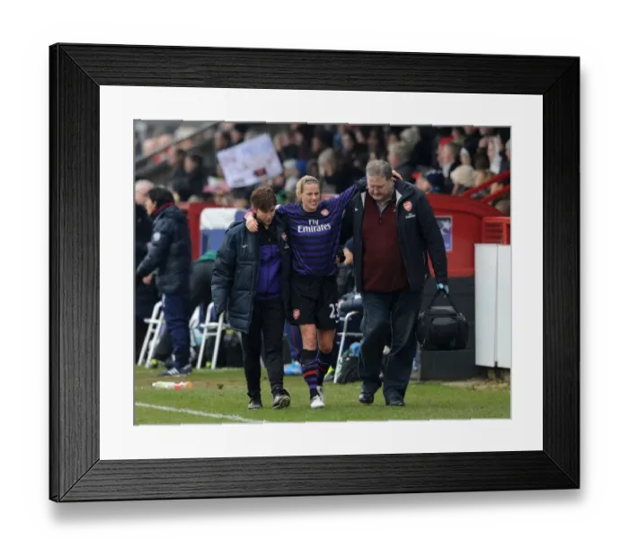 Framed Print : Arsenal's Kelly Smith Suffers Injury in UEFA Women's Champions League Quarterfinal against ASD Torres CF