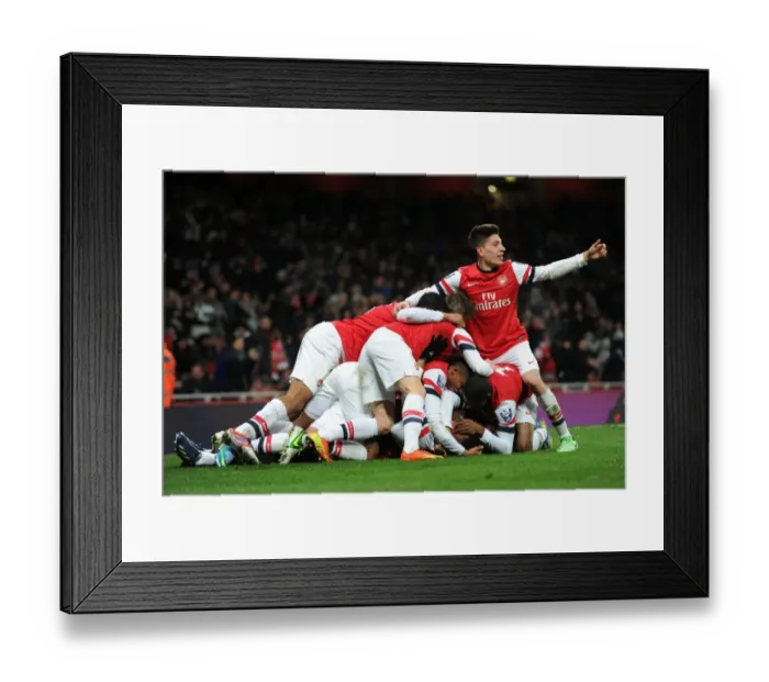 Framed Print : Serge Gnabry's Stunner: Arsenal U19s Celebrate in Quarter Final Victory