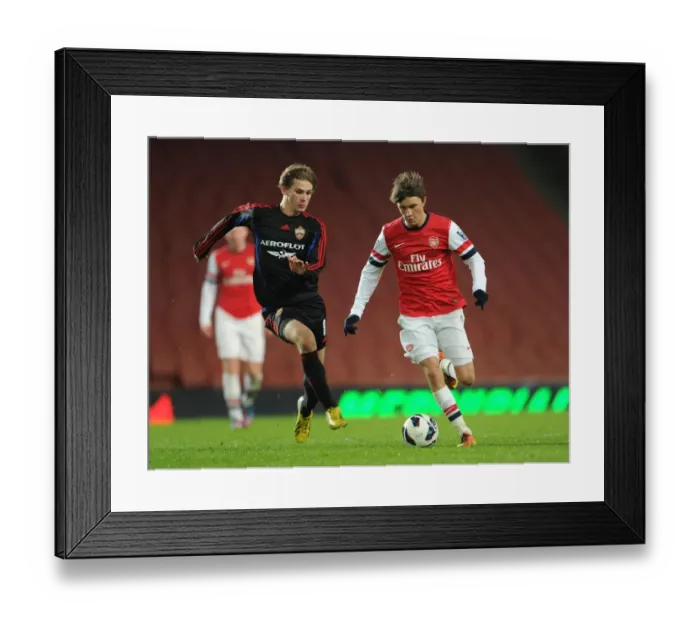 Framed Print : Arsenal's Kris Olsson Outpaces CSKA's Khurtsidze in NextGen Series Quarterfinal