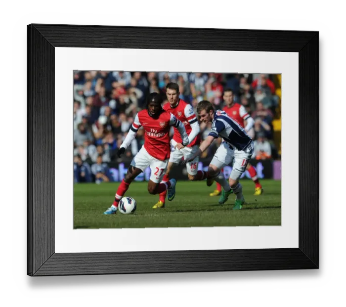 Framed Print : Gervinho vs. Chris Brunt: Battle at The Hawthorns - West Bromwich Albion vs. Arsenal (2012-13)