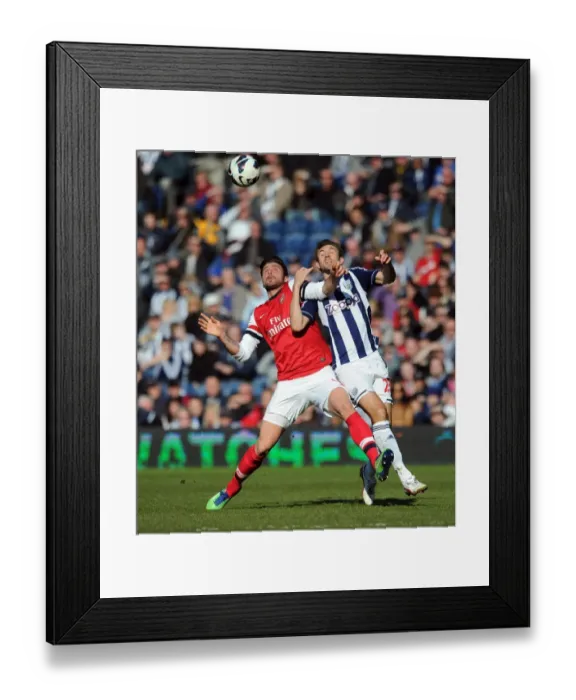 Framed Print : Giroud vs McAuley: A Footballing Battle at The Hawthorns - Arsenal vs West Bromwich Albion (2013)