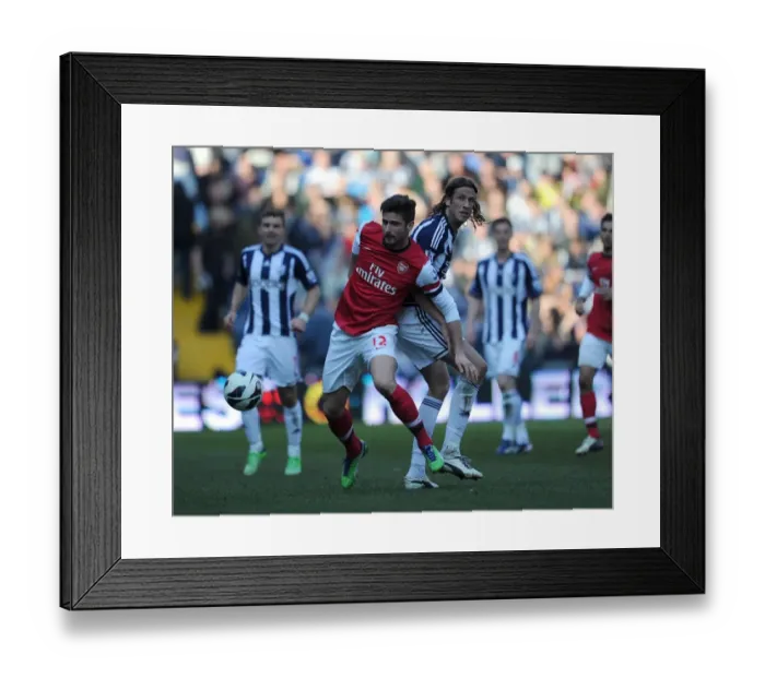 Framed Print : Giroud vs. Olsson: Intense Tussle in West Bromwich Albion vs. Arsenal Premier League Clash Framed Print : Giroud vs. Olsson: Intense Tussle in West Bromwich Albion vs. Arsenal Premier League Clash