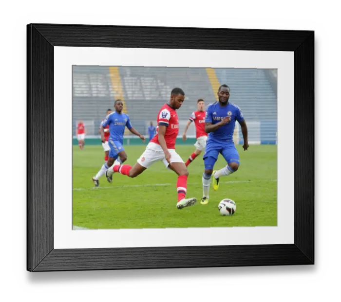 Framed Print : Arsenal U19 vs. Chelsea U19: Tense Moment as Zak Ansah Crosses under Pressure in NextGen Series Semi-Final