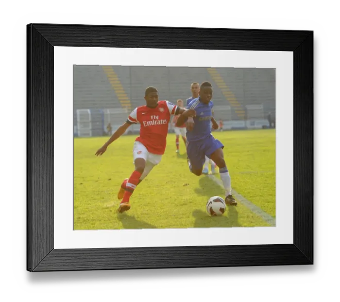 Framed Print : Arsenal's Ainsley Maitland-Niles Clashes with Chelsea's Kevin Wright in NextGen Series Semi-Final
