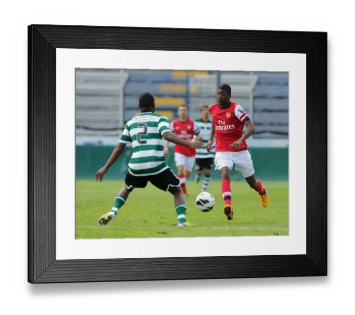 Framed Print : Ainsley Maitland-Niles vs. Mauro Riquicho: Arsenal U19 vs. Sporting Lisbon U19 - NextGen Series 3rd Place Play Off, Italy, 2013