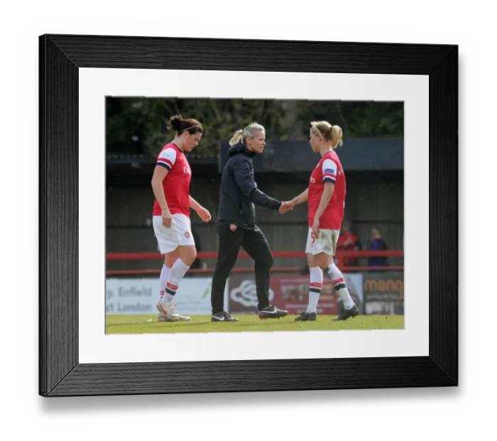Framed Print : Shelley Kerr and Gilly Flaherty: A Moment of Sportsmanship in the Arsenal Ladies FC vs. VfL Wolfsburg UEFA Women's Champions League Semi-Final