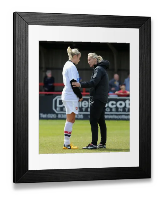 Framed Print : Shelley Kerr and Steph Houghton: Pre-Match Conversation between Arsenal Ladies FC and VfL Wolfsburg in UEFA Women's Champions League Semi-Final