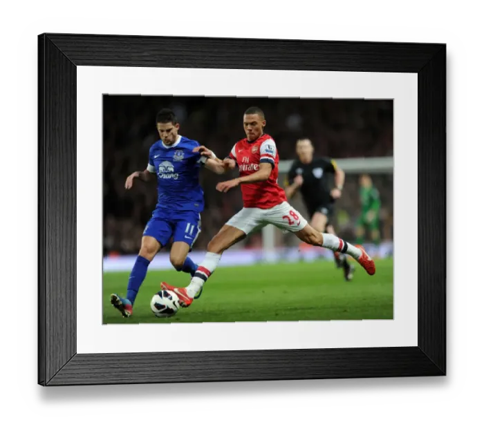 Framed Print : Arsenal vs. Everton: Kieran Gibbs Tackles Kevin Mirallas in Intense Premier League Clash Framed Print : Arsenal vs. Everton: Kieran Gibbs Tackles Kevin Mirallas in Intense Premier League Clash