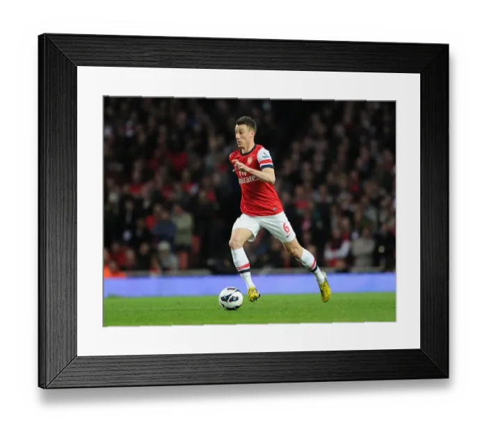 Framed Print : Arsenal's Laurent Koscielny in Action Against Everton (2012-13) Framed Print : Arsenal's Laurent Koscielny in Action Against Everton (2012-13)