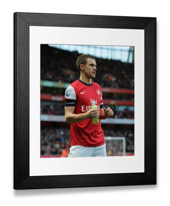 Framed Print : Aarom Ramsey (Arsenal) lucazade. Arsenal 0: 0 Everton. Barclays Premier League. Emirates Stadium