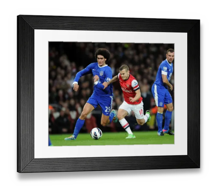 Framed Print : Intense Rivalry: Wilshere vs. Fallaini Clash in Arsenal vs. Everton Premier League Match