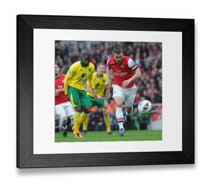 Framed Print : Lukas Podolski (Arsenal). Arsenal 3: 1 Norwich City. Barclays Premier League. Emirates Stadium Framed Print : Lukas Podolski (Arsenal). Arsenal 3: 1 Norwich City. Barclays Premier League. Emirates Stadium