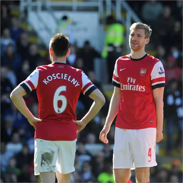Per Mertesacker with Laurent Koscielny (Arsenal). Fulham 0: 1 Arsenal. Barclays Premier League