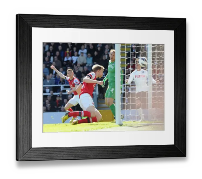Framed Print : Per Mertesacker's Header: Arsenal's Lone Goal in Fulham Clash (April 2013) Framed Print : Per Mertesacker's Header: Arsenal's Lone Goal in Fulham Clash (April 2013)