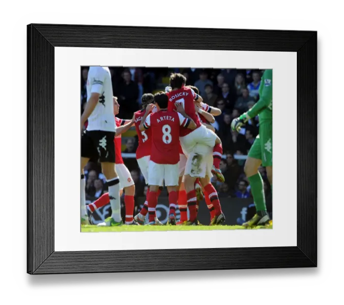 Framed Print : Arsenal Celebrate Per Mertesacker's Goal vs Fulham (2013) Framed Print : Arsenal Celebrate Per Mertesacker's Goal vs Fulham (2013)