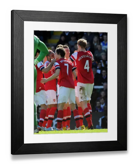 Framed Print : Per Mertesacker celebrates scoring his goal for Arsenal with Laurent Koscielny. Fulham 0: 1 Arsenal Framed Print : Per Mertesacker celebrates scoring his goal for Arsenal with Laurent Koscielny. Fulham 0: 1 Arsenal
