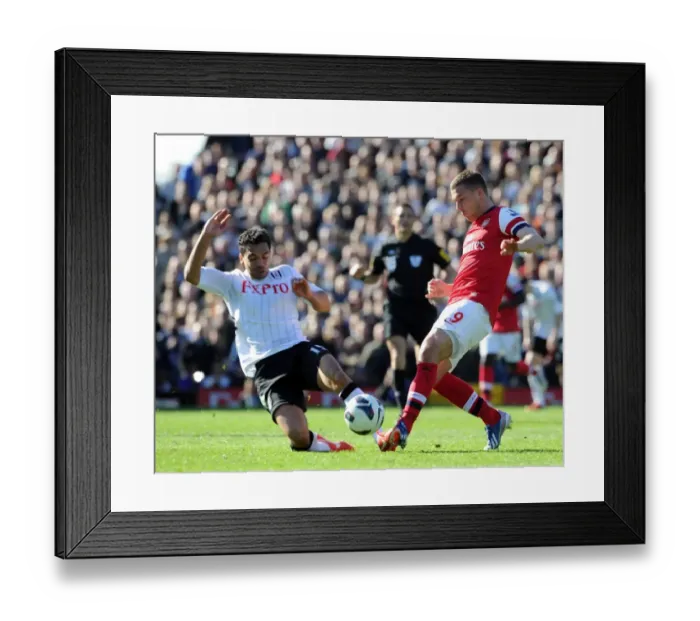 Framed Print : Clash at Craven Cottage: Lukas Podolski vs. Kieran Richardson Framed Print : Clash at Craven Cottage: Lukas Podolski vs. Kieran Richardson