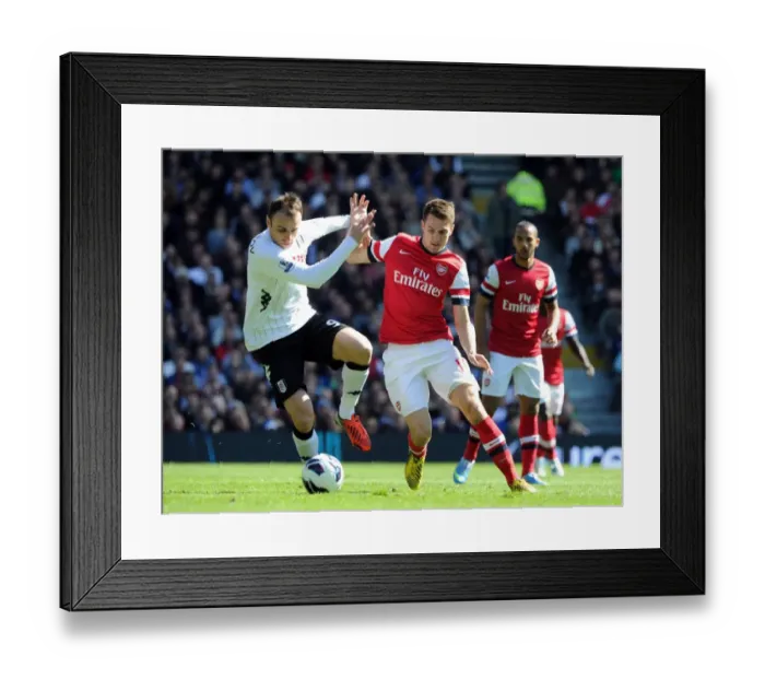 Framed Print : Ramsey vs. Berbatov: Intense Battle in Fulham vs. Arsenal Premier League Clash