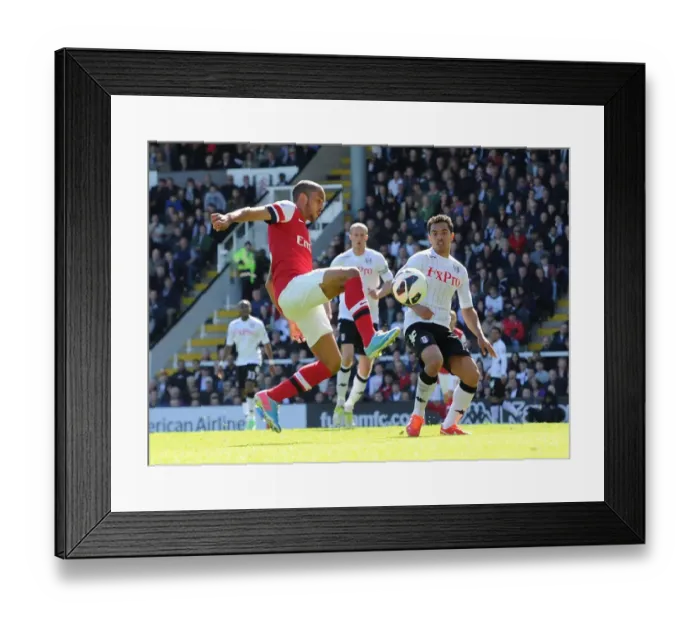 Framed Print : Theo Walcott vs. Kieran Richardson: Intense Battle at Craven Cottage during Arsenal's Premier League Victory Framed Print : Theo Walcott vs. Kieran Richardson: Intense Battle at Craven Cottage during Arsenal's Premier League Victory