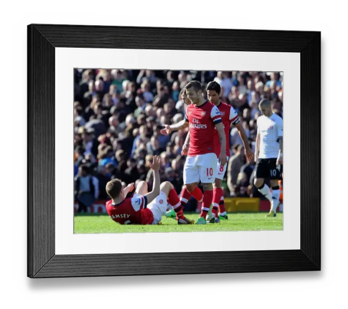 Framed Print : Jack Wilshere Consoles Emotional Aaron Ramsey After Fulham vs. Arsenal Clash (2013)