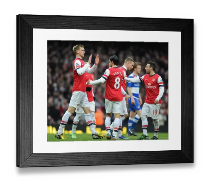 Framed Print : Arsenal's Victory: Mikel Arteta and Team Celebrate Four Goals Against Reading (2013) Framed Print : Arsenal's Victory: Mikel Arteta and Team Celebrate Four Goals Against Reading (2013)