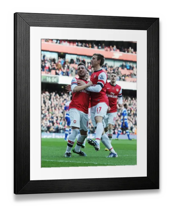 Framed Print : Celebrating Glory: Unforgettable Moment of Victory - Santi Cazorla and Nacho Monreal's Goal Dance for Arsenal vs. Reading (2013)