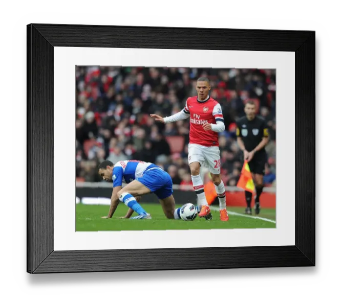 Framed Print : Arsenal's Kieran Gibbs Outmaneuvers Reading's Hal Robson-Kanu during the 2012-13 Premier League Match