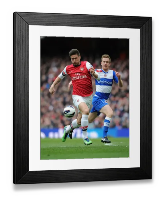 Framed Print : Arsenal's Olivier Giroud Scores Past Reading's Alex Pearce - Premier League 2012-13 Framed Print : Arsenal's Olivier Giroud Scores Past Reading's Alex Pearce - Premier League 2012-13