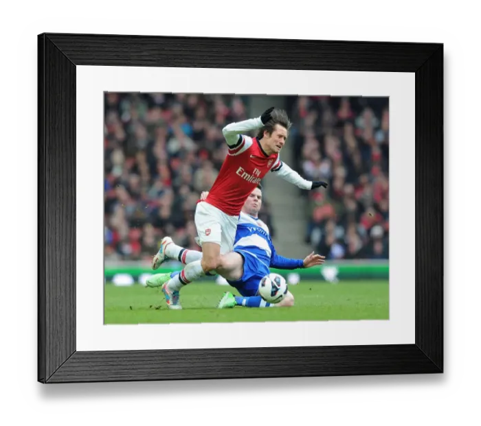 Framed Print : Arsenal's Rosicky Outsmarts Guthrie: A Premier League Battle at Emirates Stadium Framed Print : Arsenal's Rosicky Outsmarts Guthrie: A Premier League Battle at Emirates Stadium