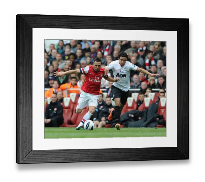 Framed Print : Clash of Stars: Cazorla vs. Rafael in Arsenal vs. Manchester United Showdown