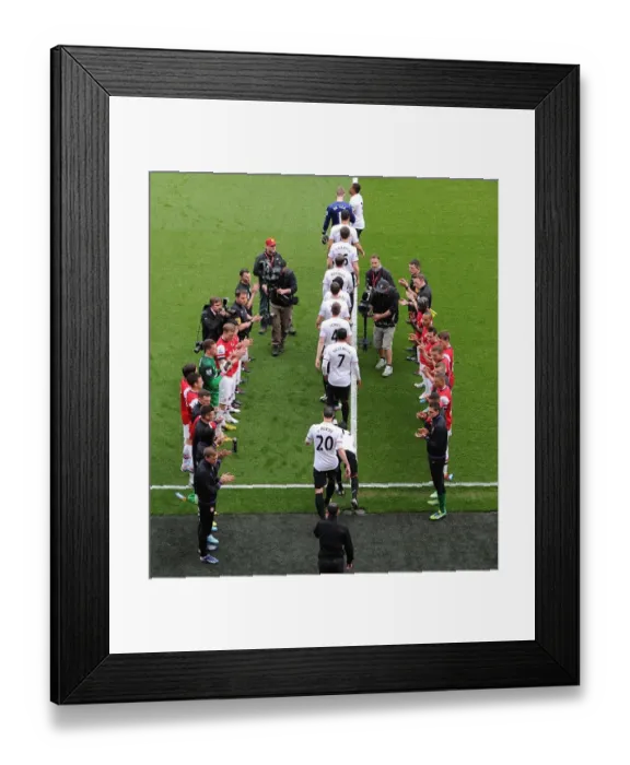 Framed Print : The Arsenal team form a guard of honour for Premier League Champions Manchester United Framed Print : The Arsenal team form a guard of honour for Premier League Champions Manchester United