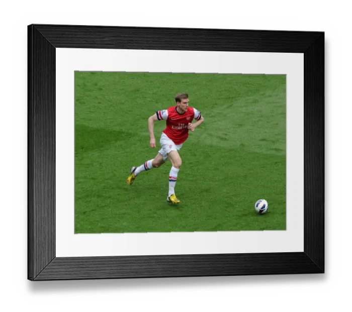 Framed Print : Per Mertesacker: Arsenal's Unyielding Shield vs. Manchester United (2012-13) Framed Print : Per Mertesacker: Arsenal's Unyielding Shield vs. Manchester United (2012-13)