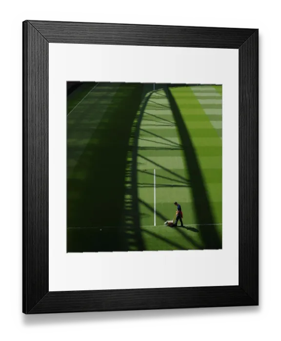 Framed Print : Arsenal vs Manchester United: Pre-Match Groundsmen Preparation at Emirates Stadium