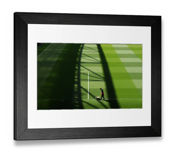 Framed Print : Arsenal vs Manchester United: Pre-Match Groundsmen Preparation at Emiras Stadium, 2013
