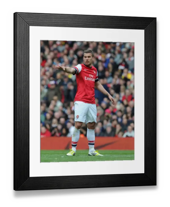 Framed Print : Lukas Podolski vs Manchester United: Clash at the Emirates, Premier League 2012-13 Framed Print : Lukas Podolski vs Manchester United: Clash at the Emirates, Premier League 2012-13