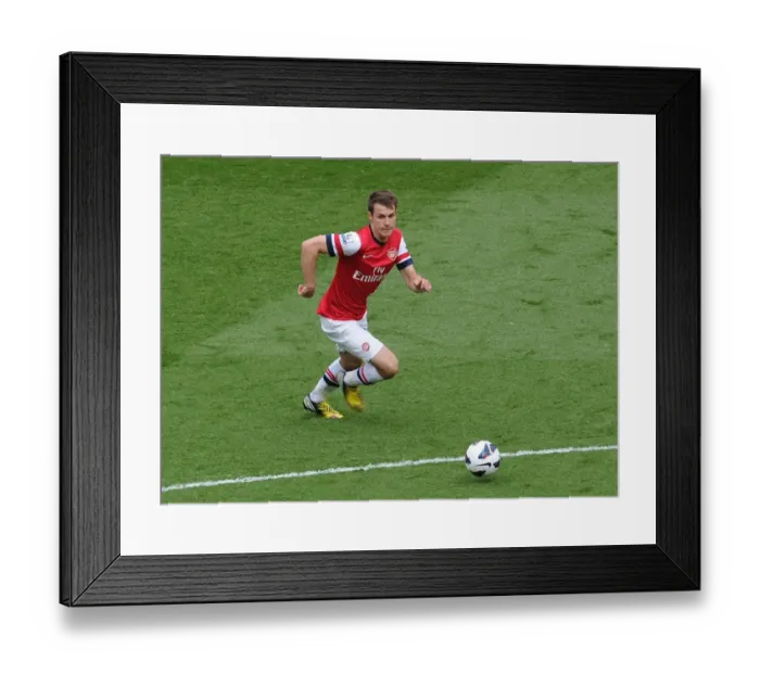 Framed Print : Aaron Ramsey (Arsenal). Arsenal 1: 1 Manchester United. Barclays Premier League. Emirates Stadium Framed Print : Aaron Ramsey (Arsenal). Arsenal 1: 1 Manchester United. Barclays Premier League. Emirates Stadium