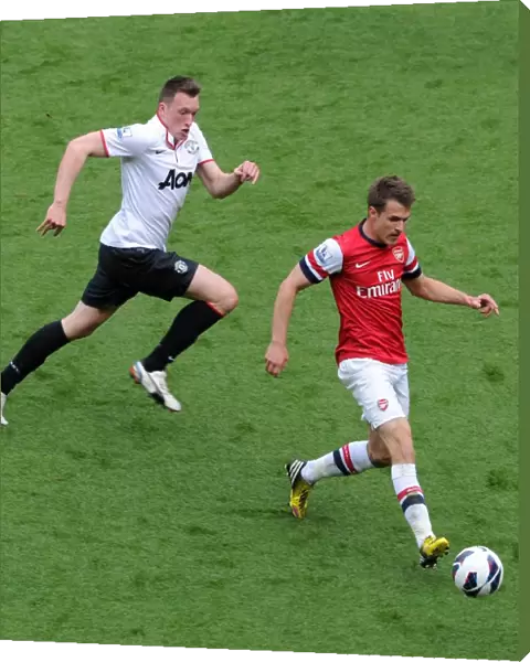 Aaron Ramsey (Arsenal) Phil Jones (Man Utd). Arsenal 1: 1 Manchester United. Barclays Premier League