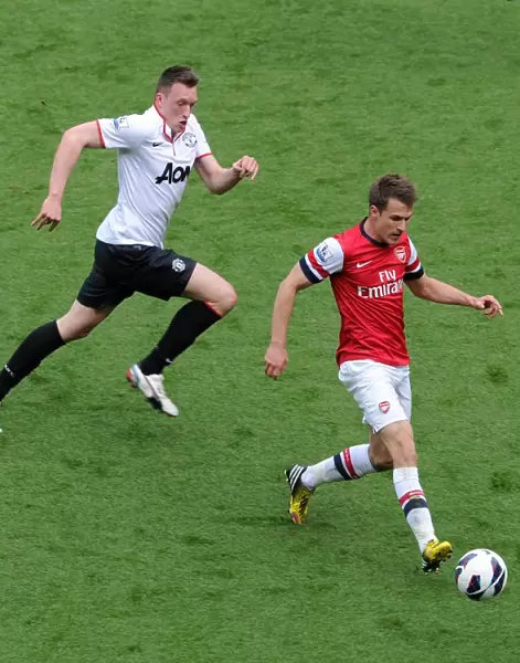 Aaron Ramsey (Arsenal) Phil Jones (Man Utd). Arsenal 1: 1 Manchester United. Barclays Premier League