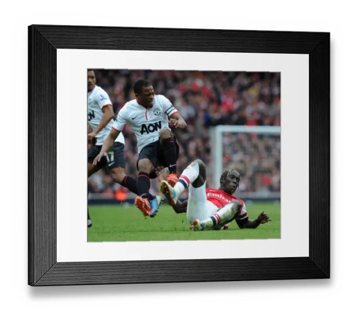 Framed Print : Clash of Titans: Sagna vs. Evra - Arsenal vs. Manchester United, Premier League, 2012-13