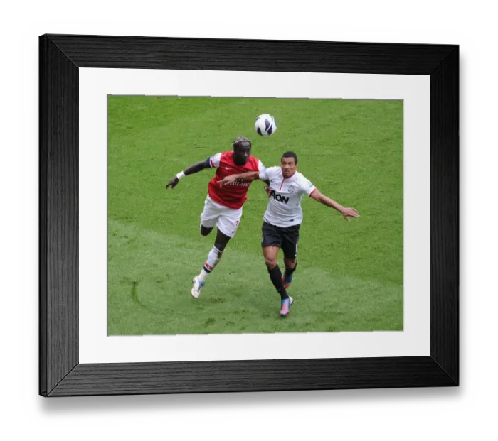 Framed Print : Clash of Titans: Sagna vs Nani - Arsenal vs Manchester United, Premier League 2012-13 Framed Print : Clash of Titans: Sagna vs Nani - Arsenal vs Manchester United, Premier League 2012-13