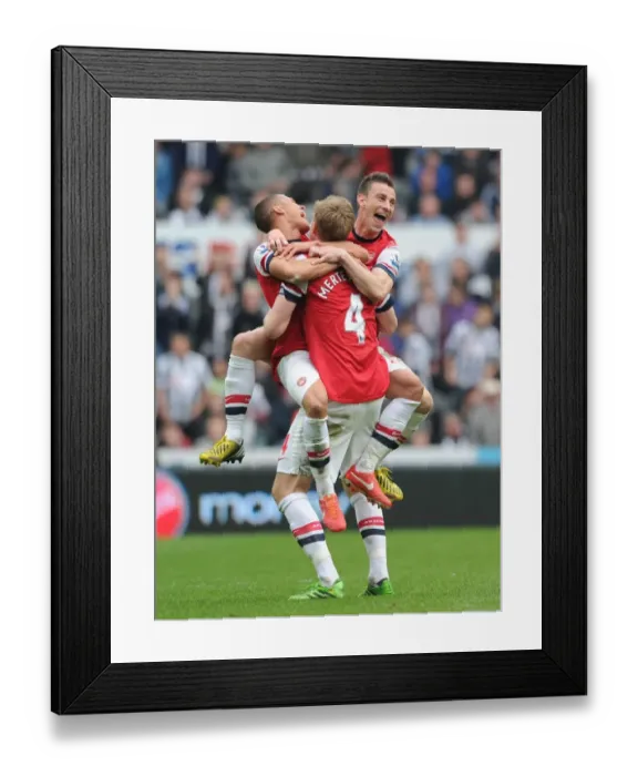 Framed Print : Arsenal's Unforgettable Triumph: Gibbs, Mertesacker, Koscielny Celebrate Premier League Victory Over Newcastle United