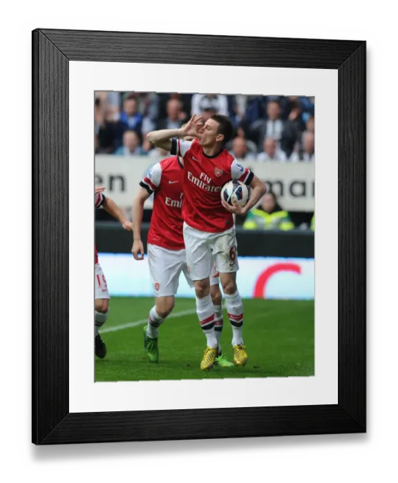 Framed Print : Koscielny's Last-Minute Drama: Arsenal Snatch Victory Over Newcastle United (2012-13)