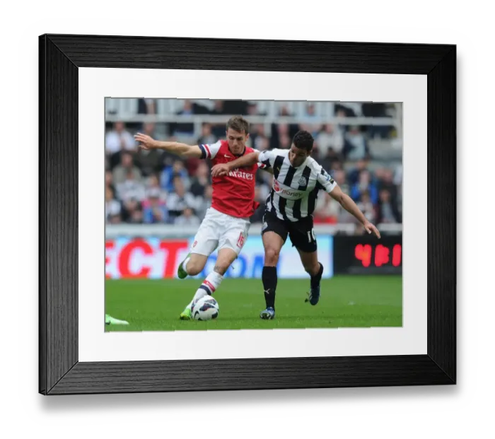 Framed Print : Clash of Stars: Ramsey vs Ben Arfa - Newcastle United vs Arsenal, Premier League 2012-13