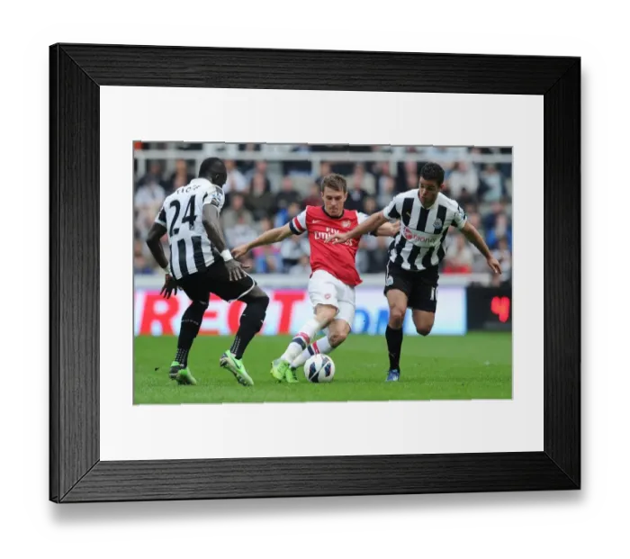 Framed Print : Clash of Stars: Ramsey vs Ben Arfa, Tiote - Newcastle United vs Arsenal (2012-13)