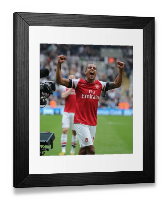 Framed Print : Theo Walcott's Celebration: Arsenal's Victory over Newcastle United (2012-13) Framed Print : Theo Walcott's Celebration: Arsenal's Victory over Newcastle United (2012-13)