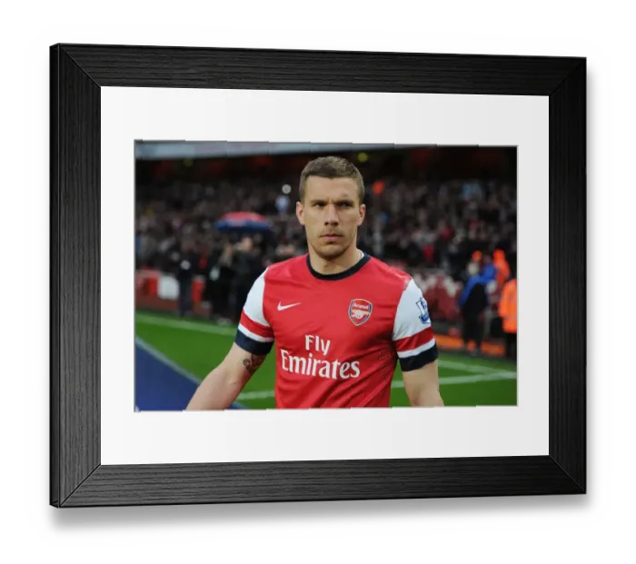 Framed Print : Arsenal's Lukas Podolski Readies for Arsenal v Wigan Athletic Clash (2012-13)
