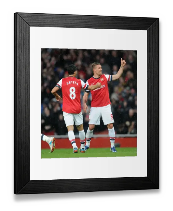 Framed Print : Podolski Scores First: Arsenal Crushes Wigan Athletic 4-1 in Premier League Framed Print : Podolski Scores First: Arsenal Crushes Wigan Athletic 4-1 in Premier League